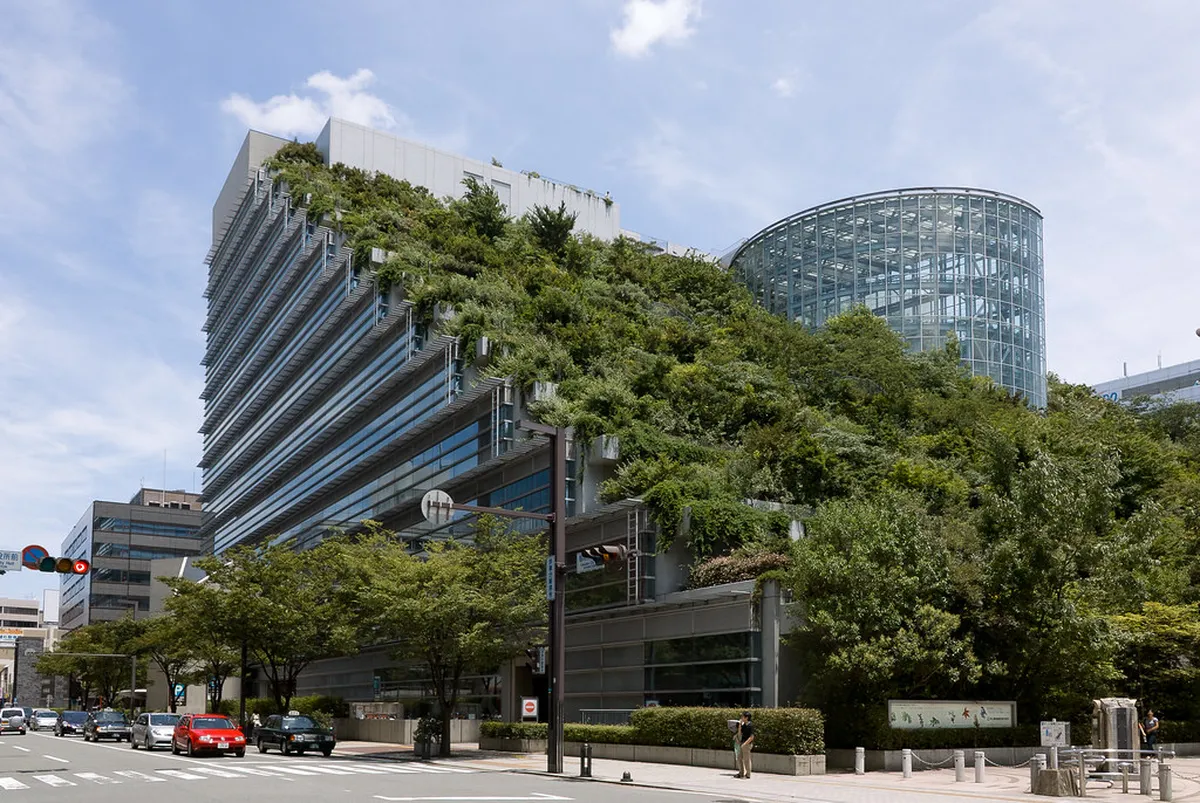 Terraced green garden levels of ACROS Fukuoka Step Garden rising like a forested mountain over Tenjin, Fukuoka