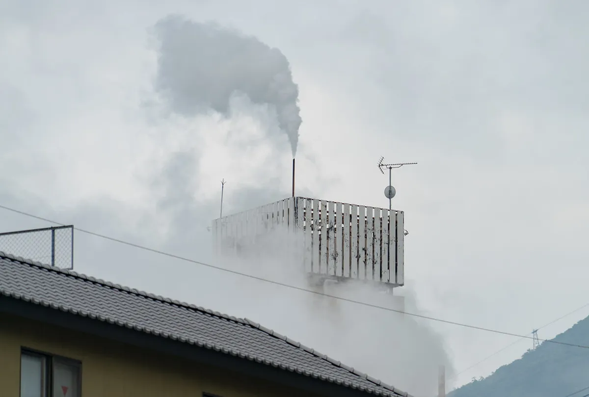 Volcanic steam rising from the geothermal vents of Beppu, Japan — the otherworldly landscape surrounding Hoyoland and the Myoban hot spring district
