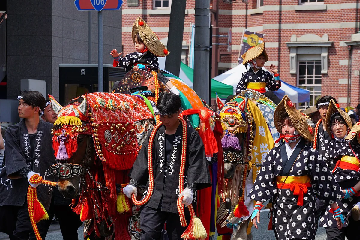 Horses in colourful harnesses and bells parade through Morioka during Chagu Chagu Umakko, Japan — 1