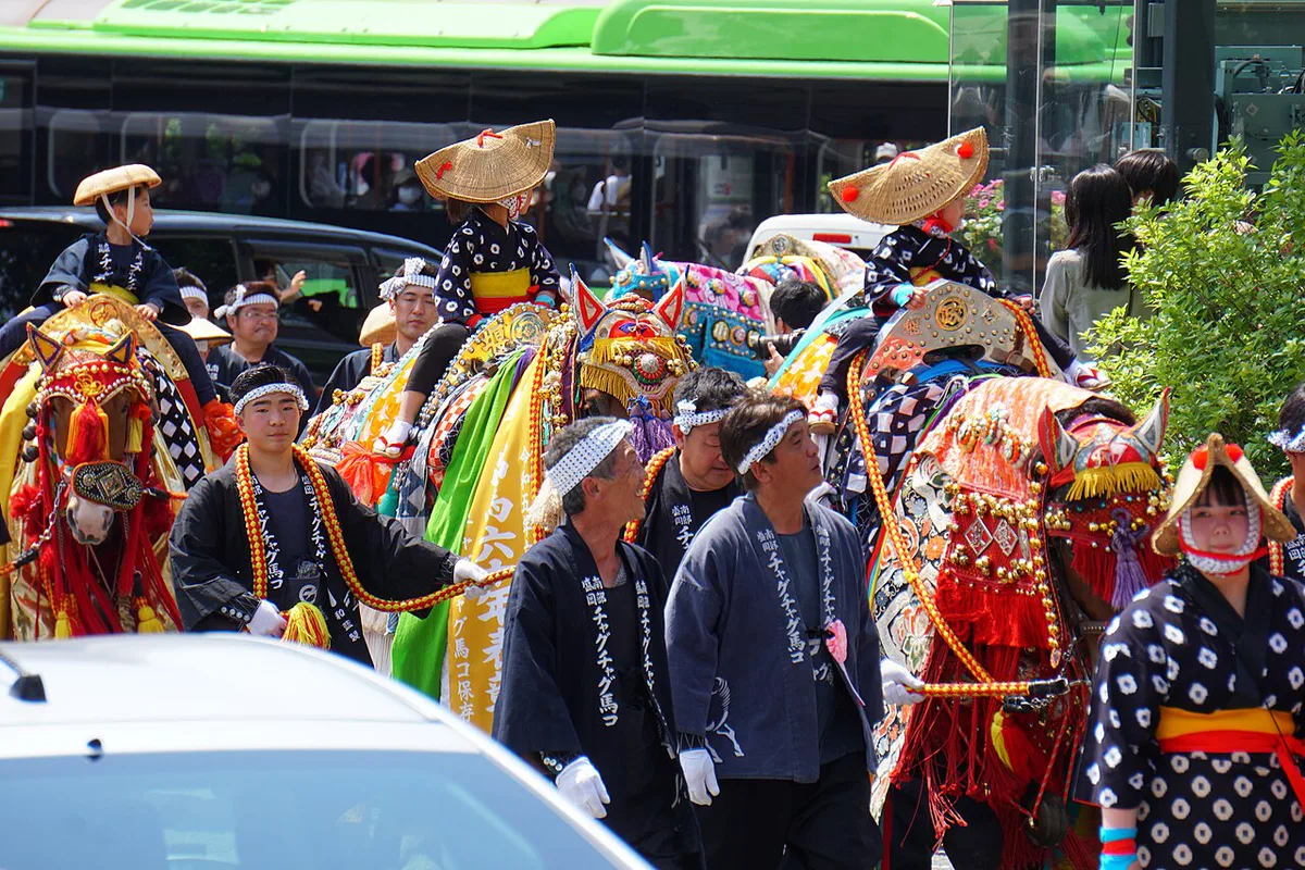 Horses in colourful harnesses and bells parade through Morioka during Chagu Chagu Umakko, Japan — 2