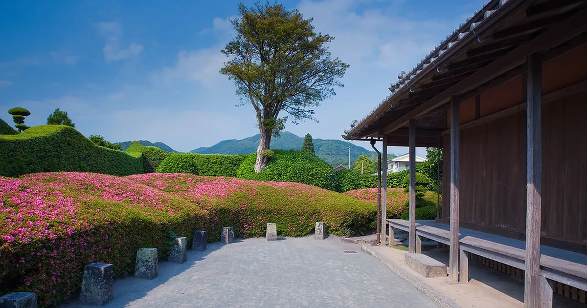 Traditional dry landscape garden of a samurai residence in Chiran Kagoshima with shaped shrubs and volcanic stone Japan