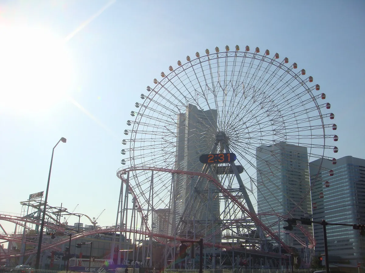Yokohama Cosmo World Ferris wheel lit up at night near the Minato Mirai waterfront Japan