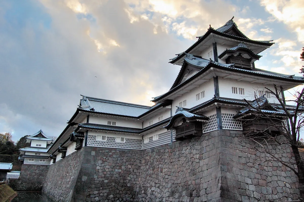 Ishikawa-mon Gate at Kanazawa Castle Park surrounded by historic stone walls