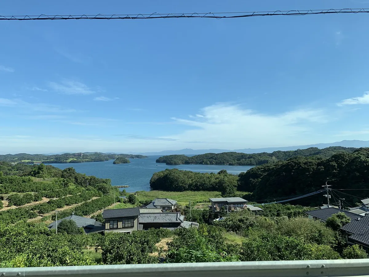 Omura Bay coastal landscape near Nagasaki with water and rocky shoreline