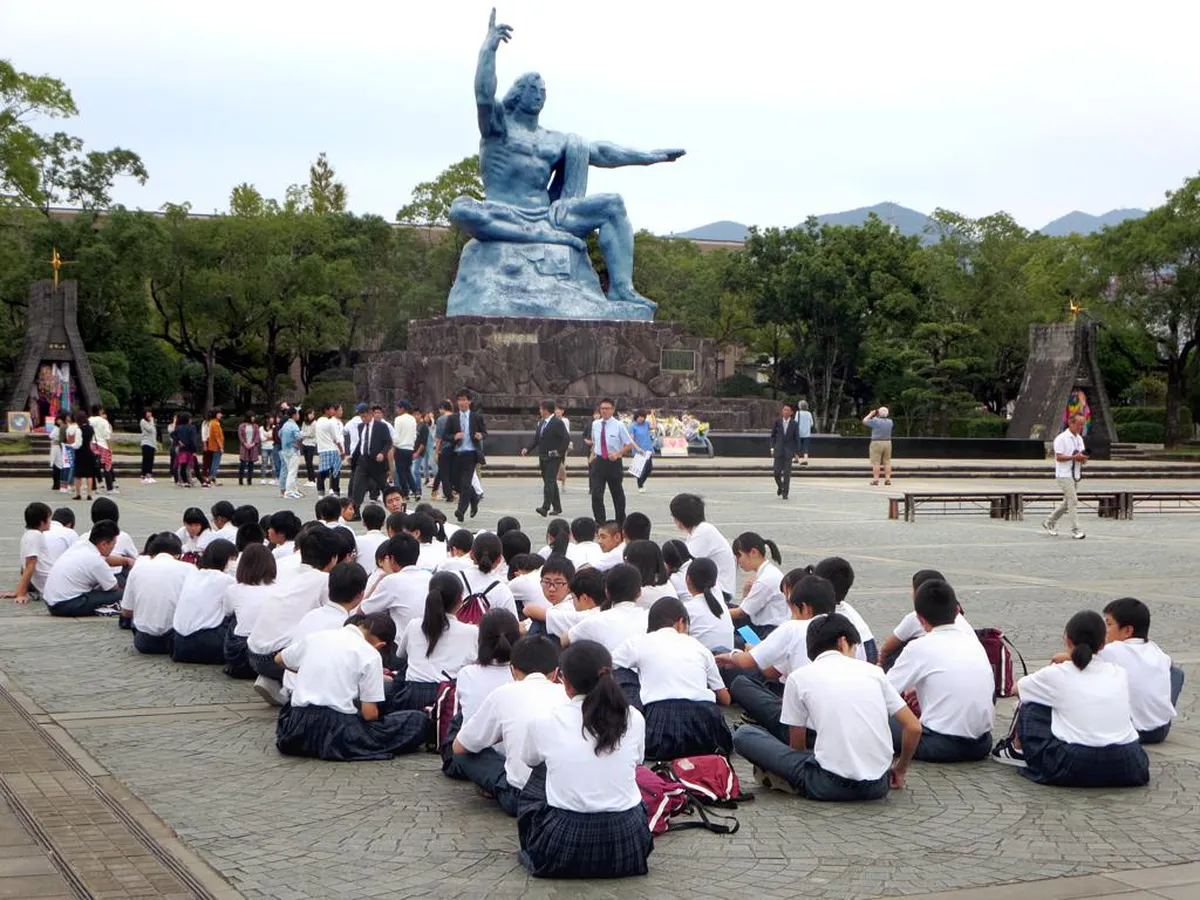 Nagasaki Peace Park with monuments and visitors walking through the memorial grounds
