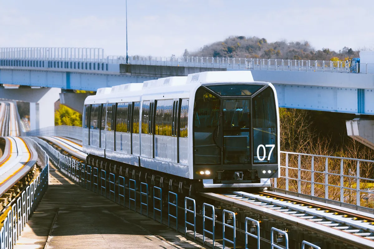 Linimo maglev train gliding on its elevated track near Nagakute Aichi — Japan's only commercial maglev service