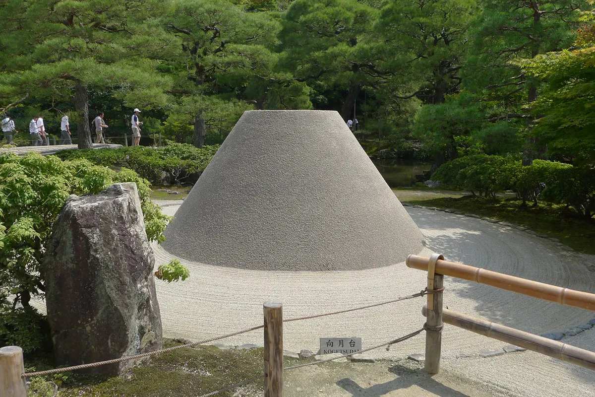 The meticulously raked Sea of Silver Sand garden at Ginkaku-ji in Kyoto with the Moon Viewing Platform cone
