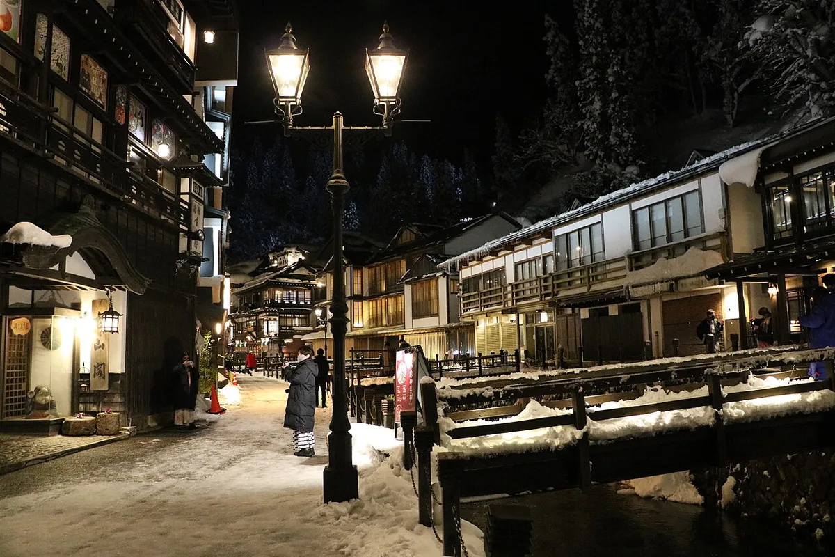 Lantern-lit Ginzan Onsen street near its small evening restaurants — 1