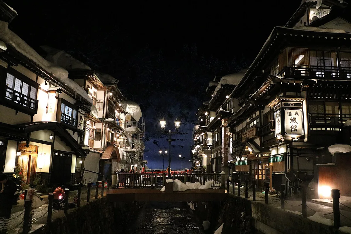 Lantern-lit Ginzan Onsen street near its small evening restaurants — 2