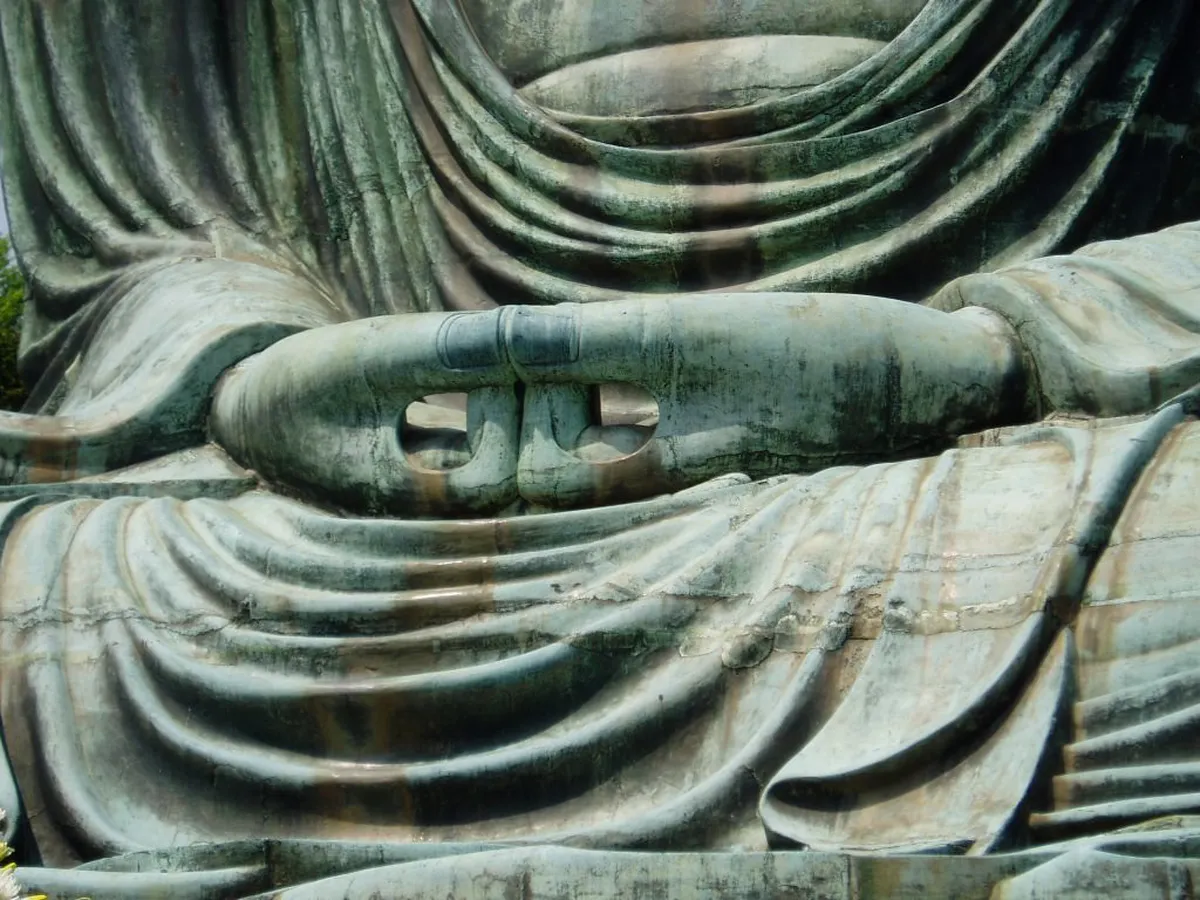 The Great Buddha of Kamakura, a massive bronze Daibutsu statue, standing in the open air at Kotoku-in temple in Kamakura, Japan