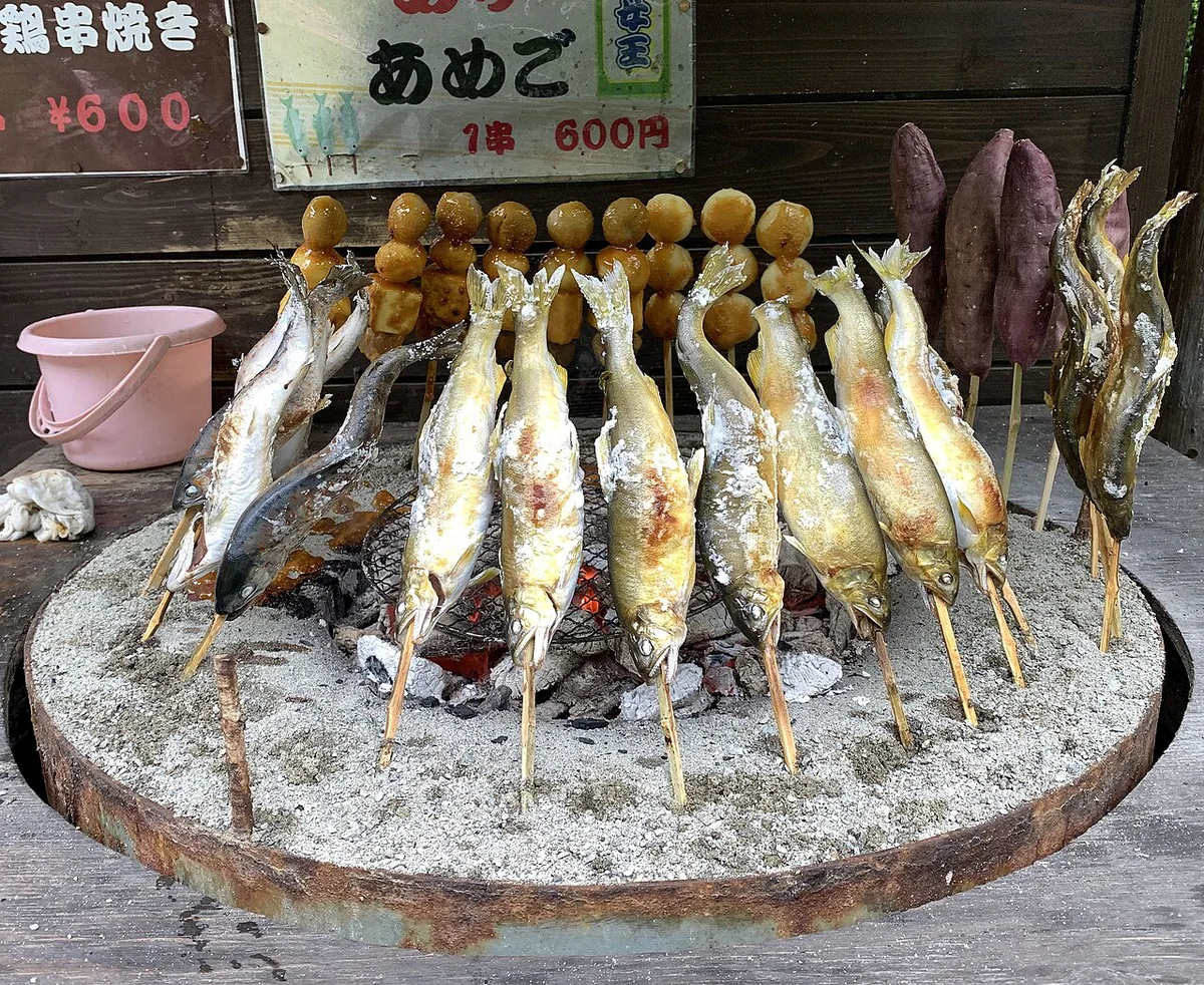 Salt-grilled Gujo ayu sweetfish beside the Yoshida River, Japan — 2