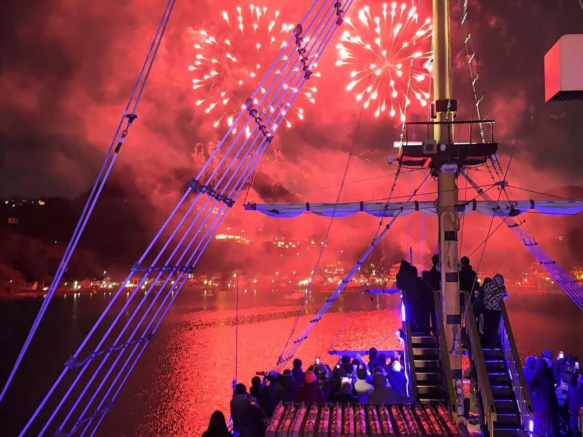 Fireworks over Lake Ashi with Hakone Shrine's torii in the foreground, Japan — 1