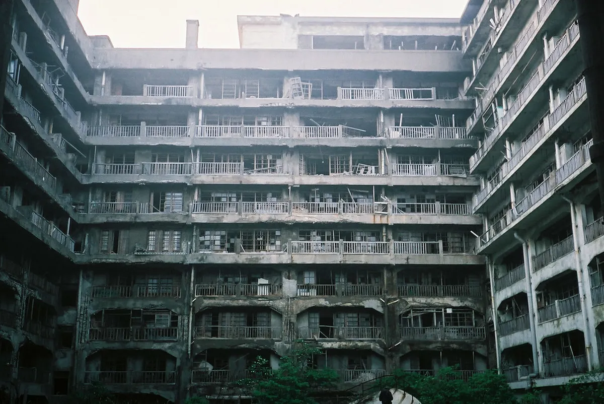 Abandoned concrete apartment buildings and ruins on Gunkanjima Hashima Island off the coast of Nagasaki, Japan
