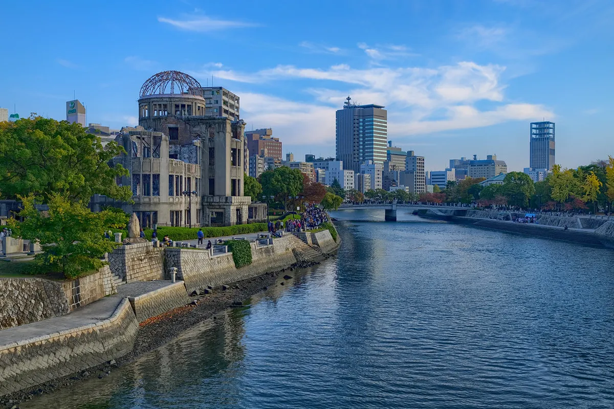 Hiroshima Peace Memorial Park with Atomic Bomb Dome across the Motoyasu River on a clear morning in Japan