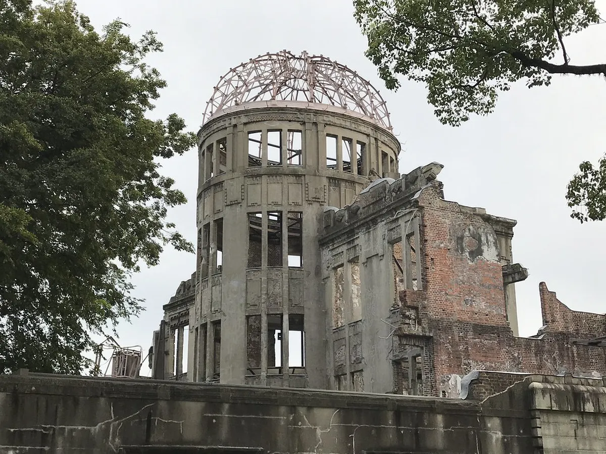 Hiroshima Atomic Bomb Dome UNESCO World Heritage site viewed free from the Motoyasu River bank in Japan