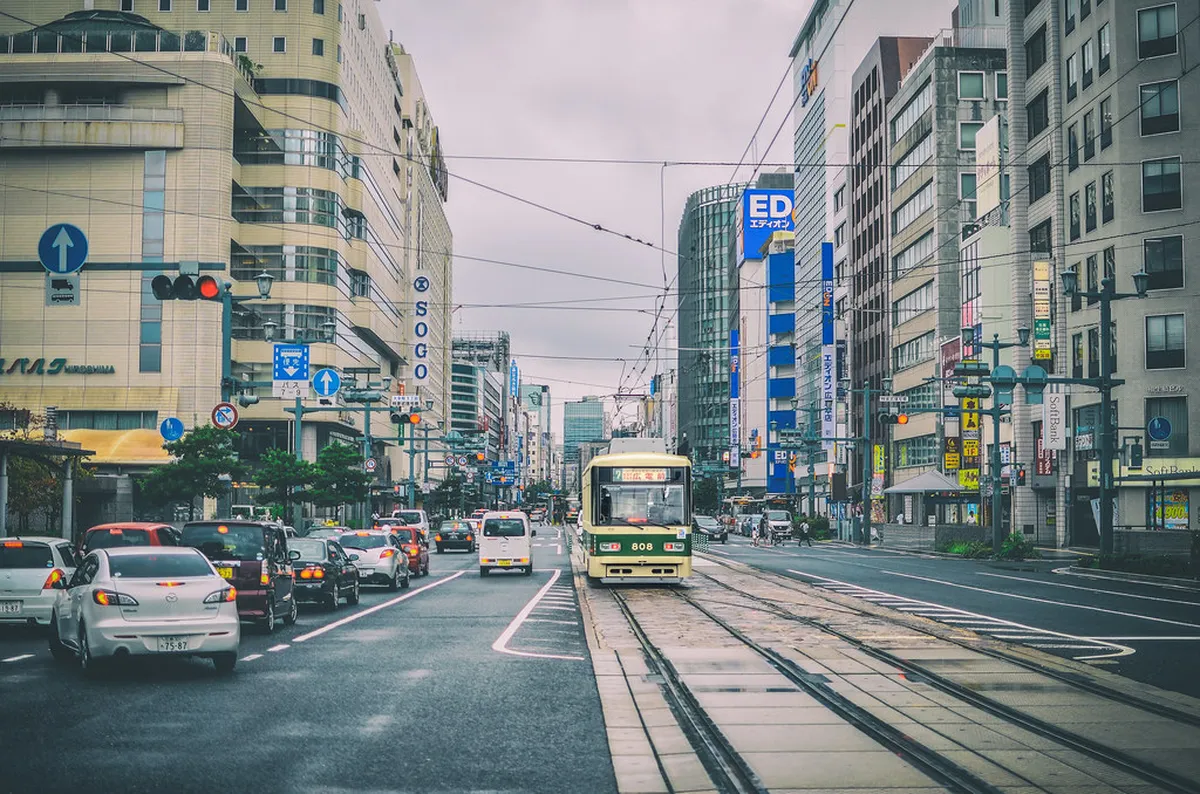 Solo traveler exploring Hiroshima city streets near the Peace Park district in Japan