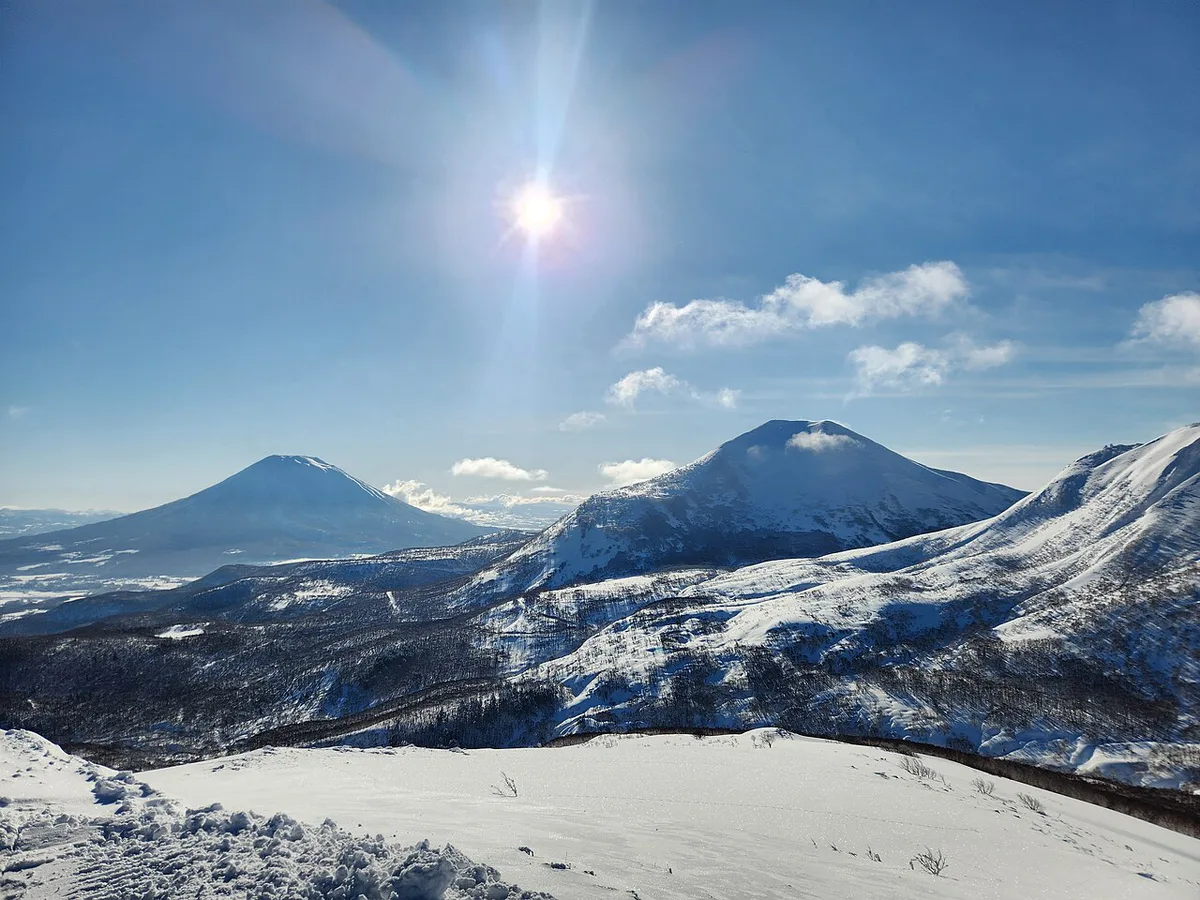 Snow-covered slopes with a view toward Mount Yotei at a Hokkaido ski resort, Japan — 1