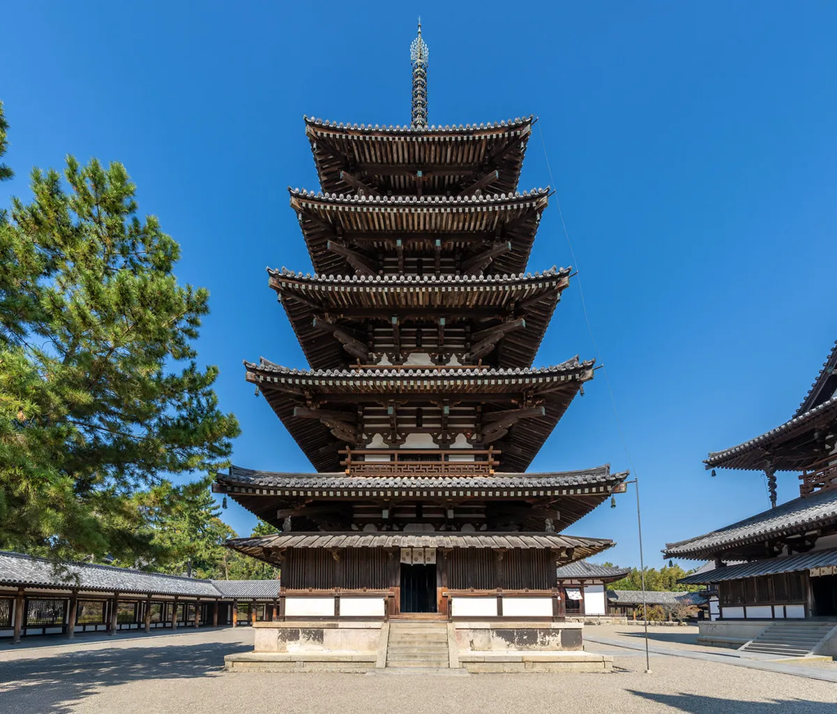 Horyu-ji five-story pagoda rising above ancient wooden structures in Ikaruga, Nara, Japan's oldest surviving wooden temple