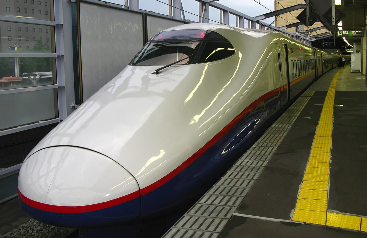 Hokuriku Shinkansen train arriving at Nagano Station for onward travel to Hakuba, Japan — 1