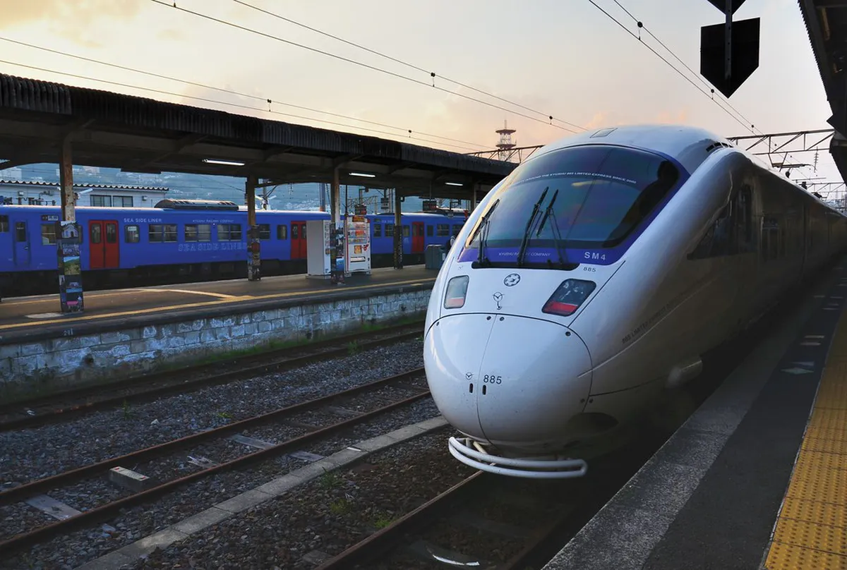 Scenic train running through Kyushu countryside from Hakata Fukuoka toward Yufuin, Japan