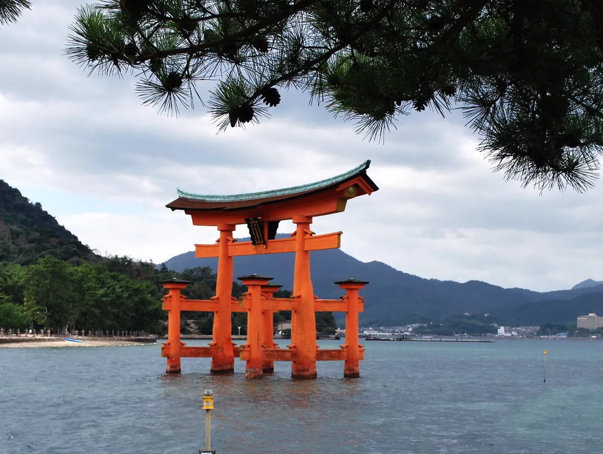 Itsukushima Shrine floating on the water at high tide during a visit to Miyajima Island, Hiroshima, Japan