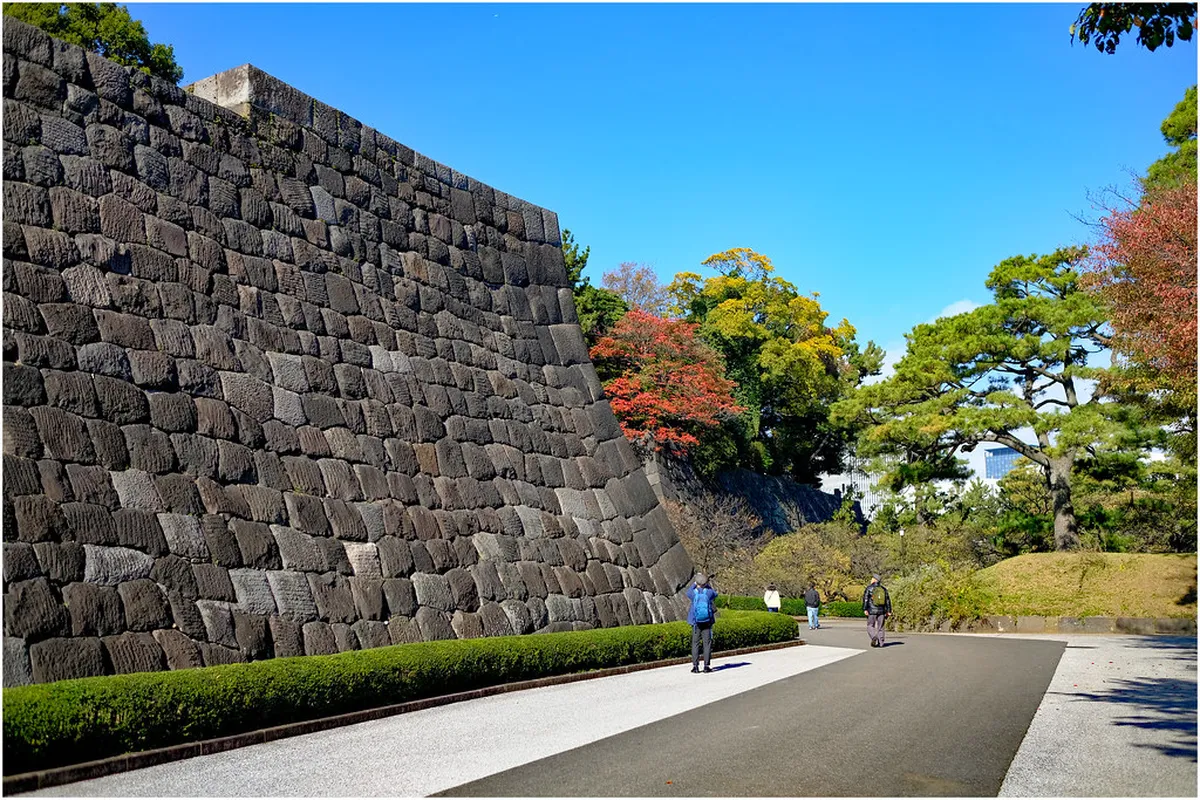 Tokyo Imperial Palace stone walls and moat reflecting the history of Edo Castle in Japan