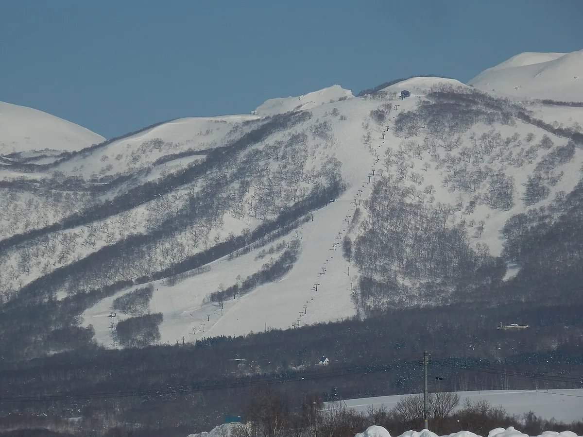 Snow-covered ski slopes at Niseko during peak powder season in January, Japan — 1
