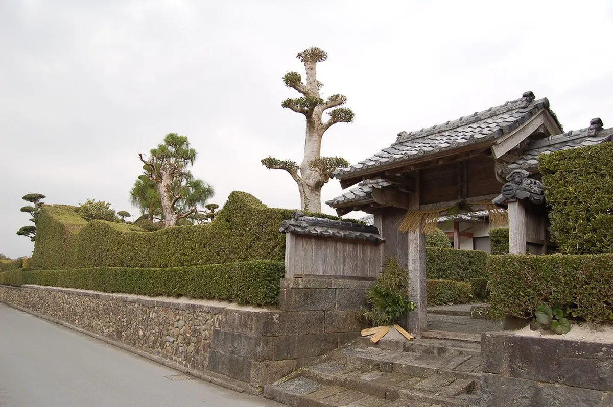 Stone-walled lane in the Chiran samurai district with preserved Edo-period residences in Kagoshima, Japan