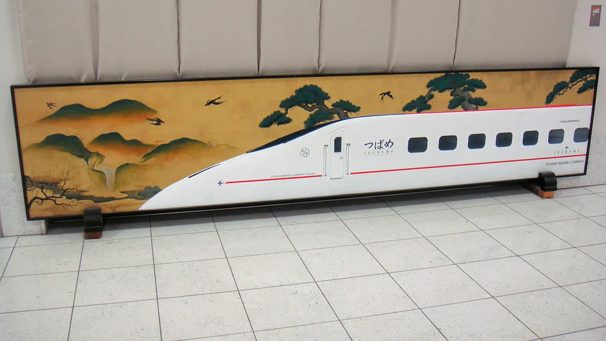 Kagoshima Chuo Station platform with Shinkansen bullet train arriving from <a href=