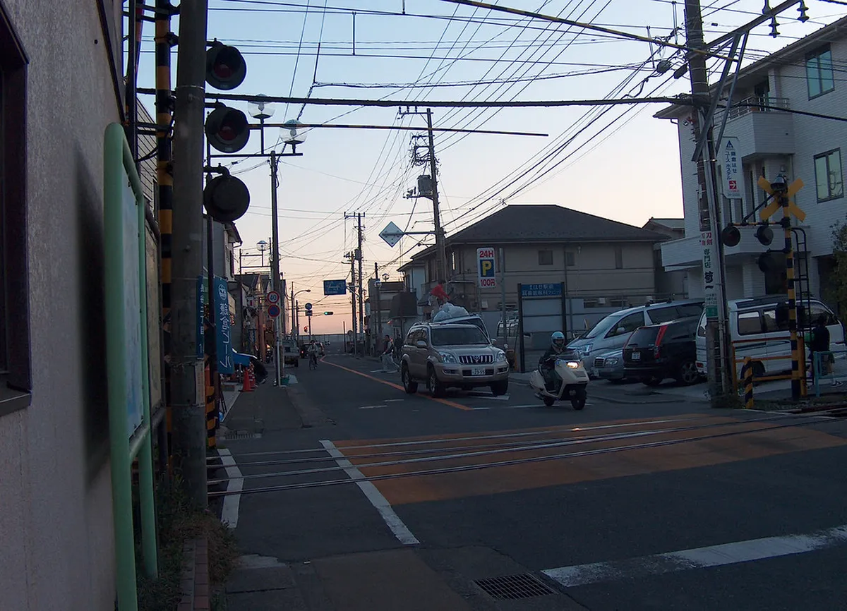 Enoshima Island connected by bridge with the iconic sea candle lighthouse and coastal scenery Japan