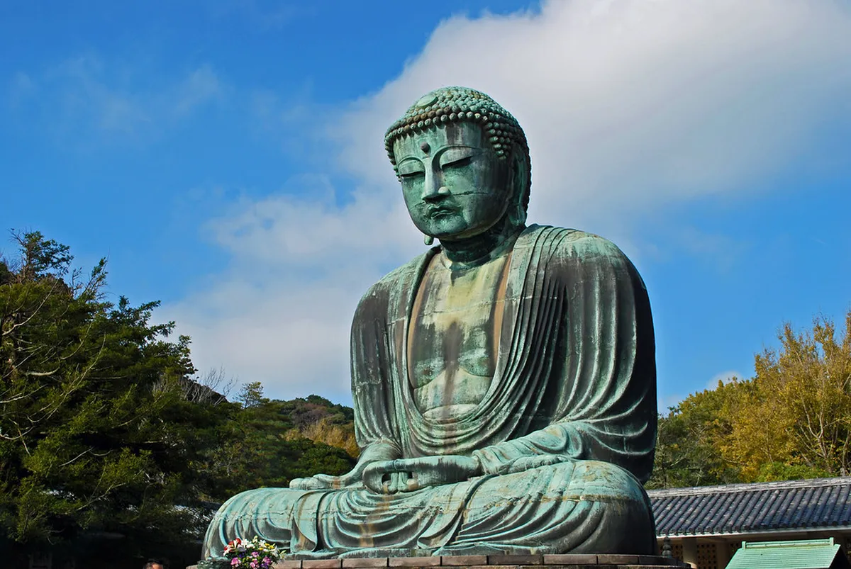 Great Buddha Daibutsu at Kotoku-in Temple bronze statue viewed from ground level in Kamakura Japan