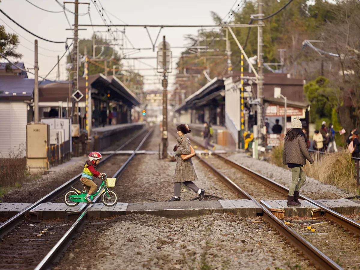 JR train pulling into Kamakura station in Japan at the start of a classic day trip from Tokyo