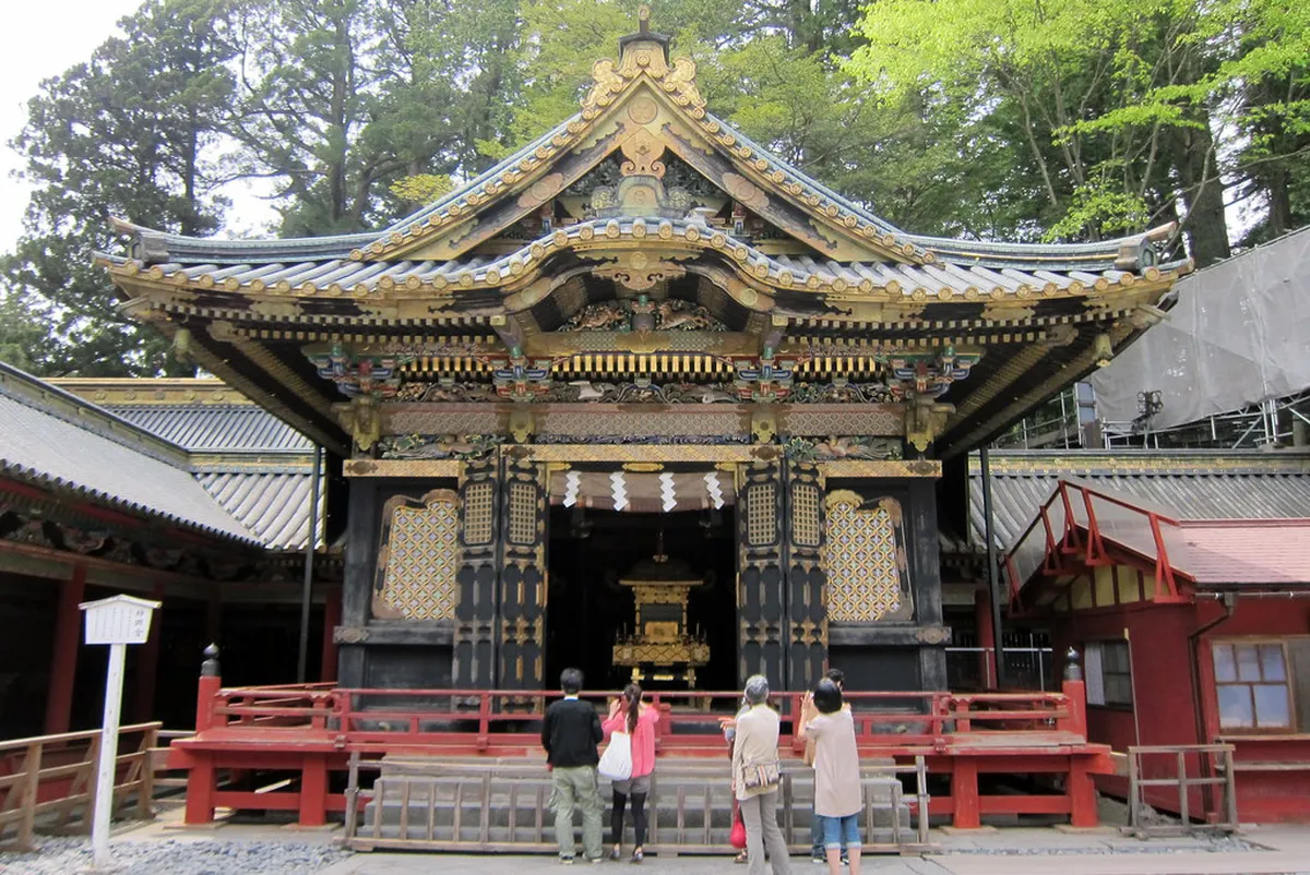 Kamakura Japan autumn festival with colorful foliage and traditional performers gathering at a historic shrine