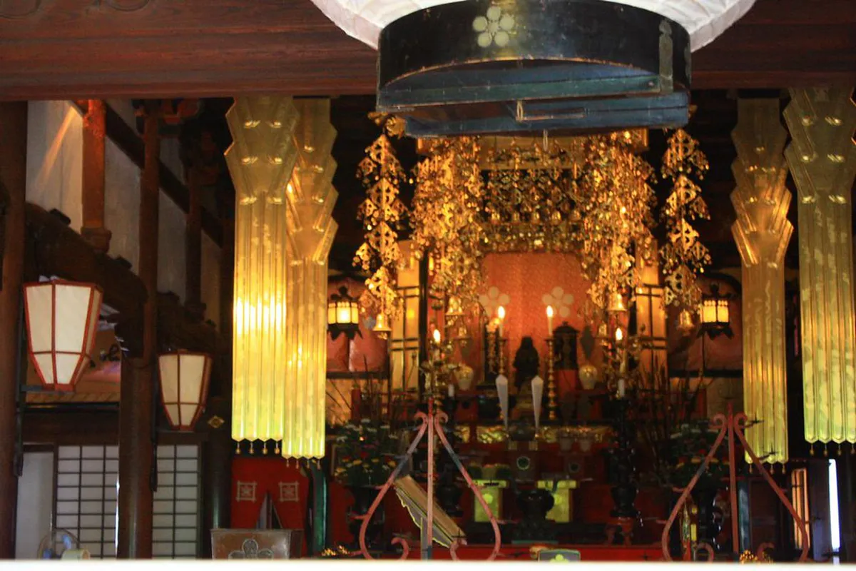 The exterior of Myoryuji Ninja Temple in Kanazawa, Japan showing the multi-storey traditional architecture with hidden defensive features