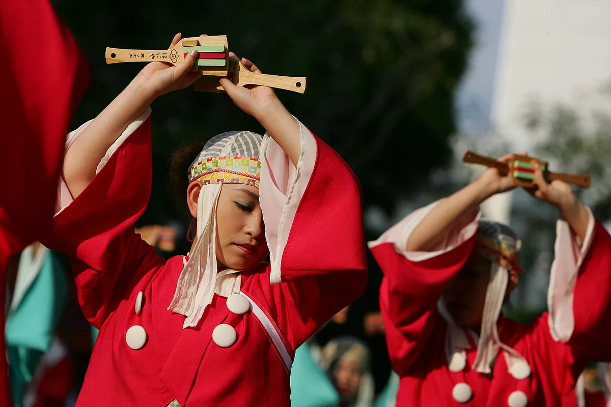 Yosakoi dance teams with naruko clappers parade through Kochi during the Yosakoi Festival, Japan — 1