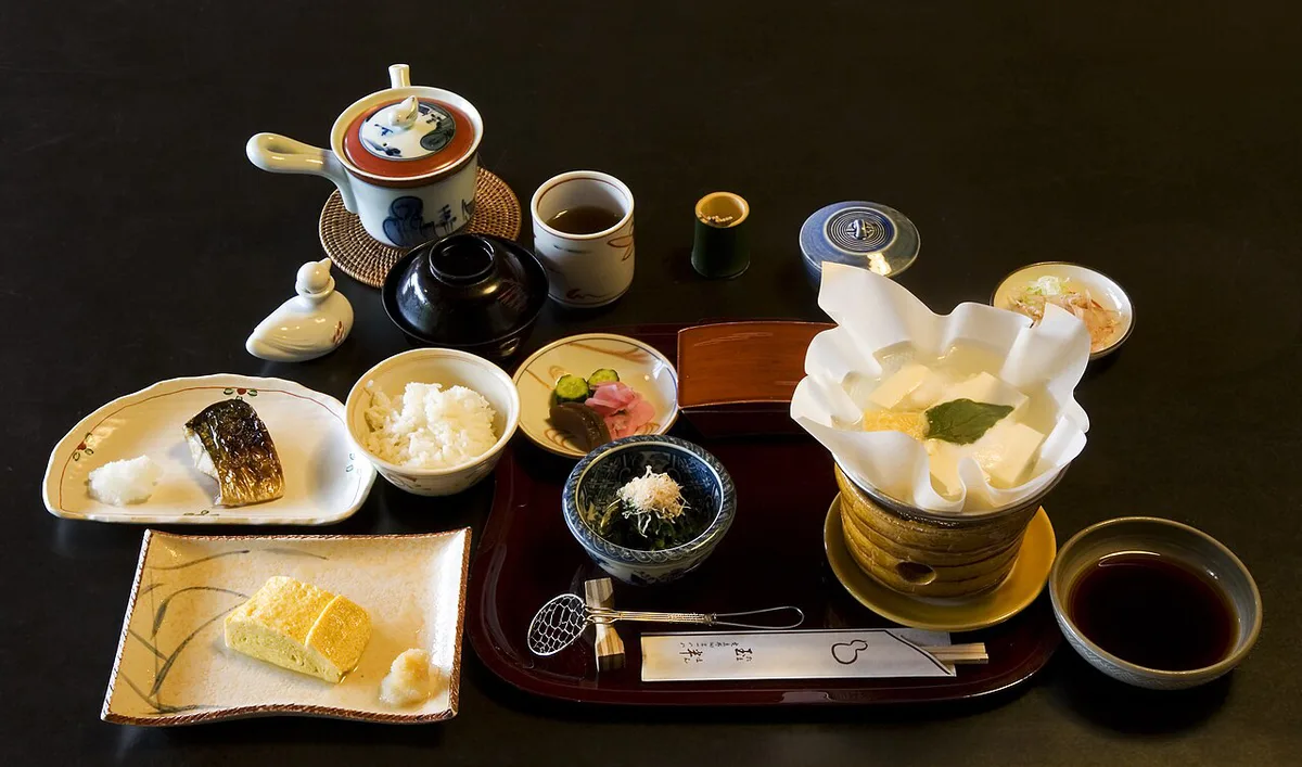 Assortment of seasonal Kyoto obanzai dishes in small bowls — 1