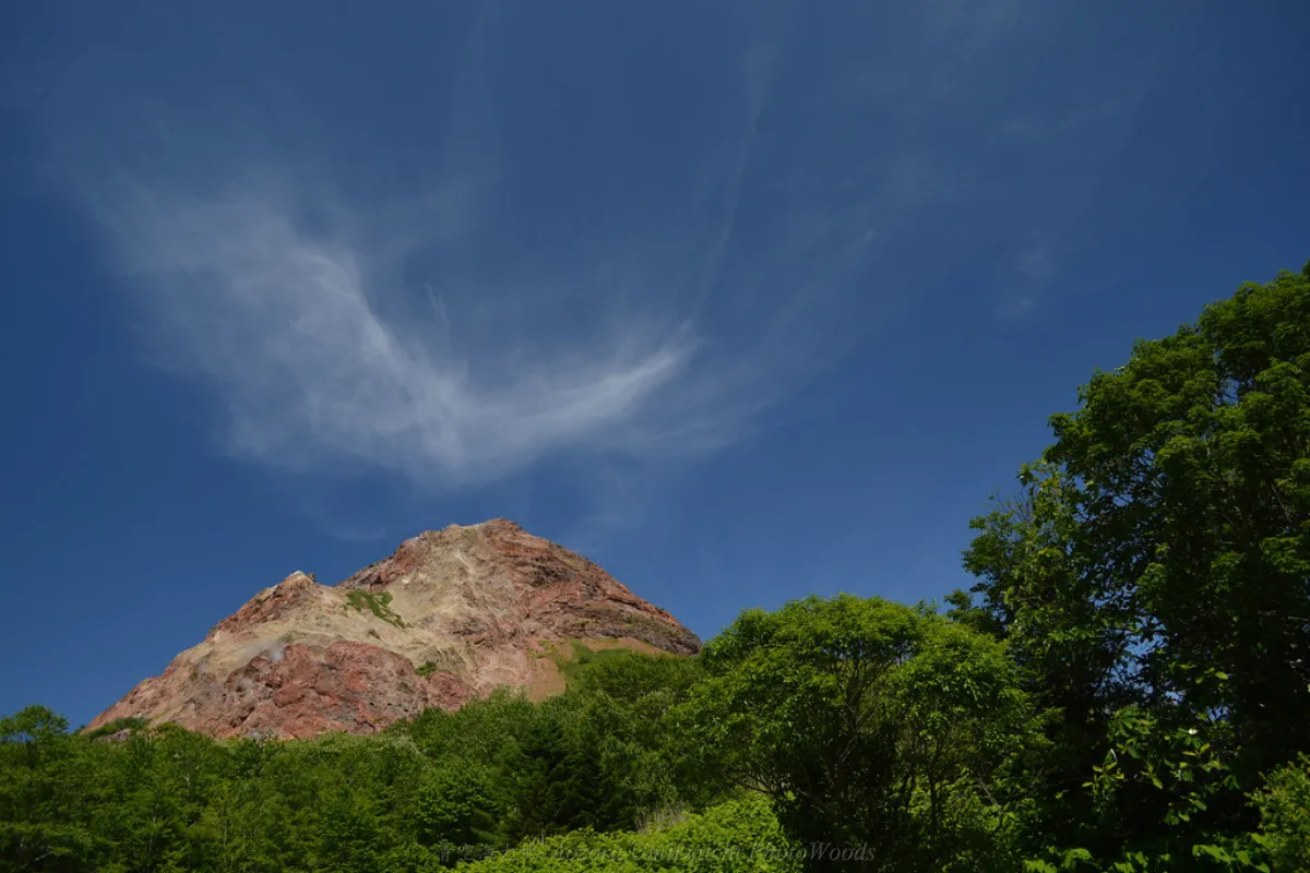Showa Shinzan volcanic cone overlooking Lake Toya, Hokkaido, Japan