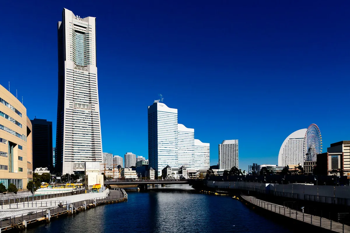 Minato Mirai 21 waterfront district in Yokohama showing the skyline along the harbor promenade