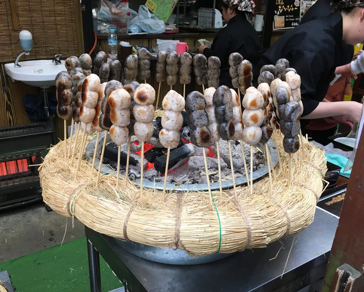Lots of dango being cooked, Mount Takao, Tokyo, photographed along this Japanese food and travel route