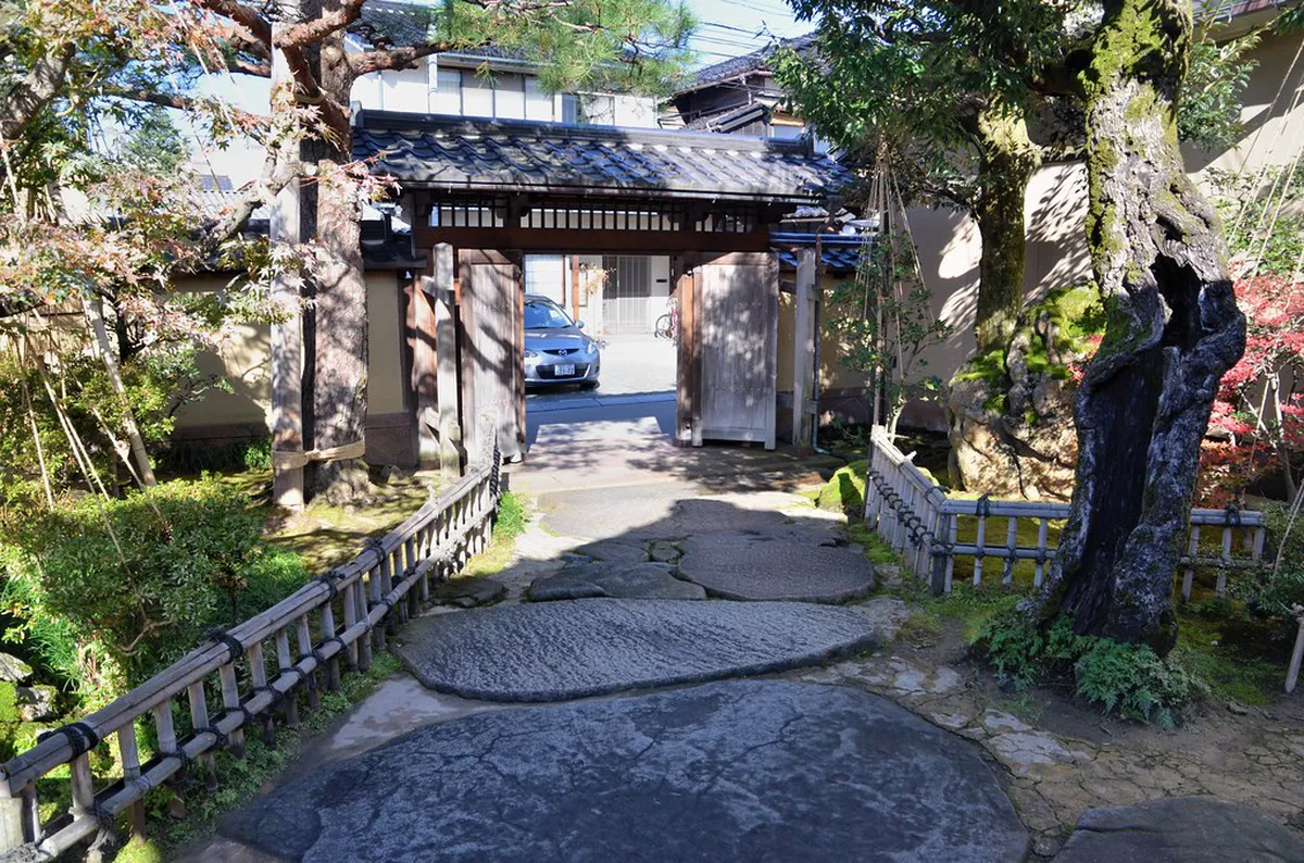 The award-winning garden at the Nomura Family Samurai House in Kanazawa's Nagamachi District, featuring a koi pond and stone lanterns