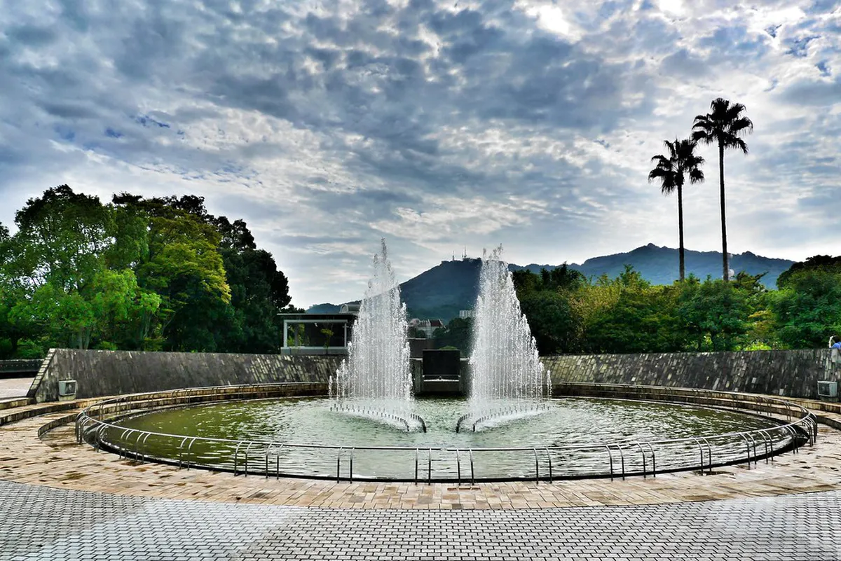 Nagasaki Peace Park with the bronze Peace Statue and surrounding memorial sculptures, Japan