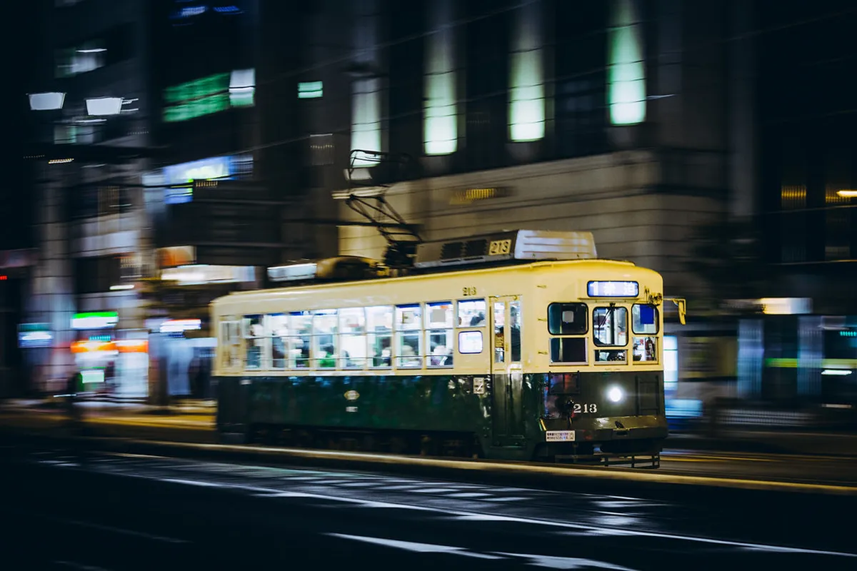 Nagasaki electric tram streetcar on city tracks