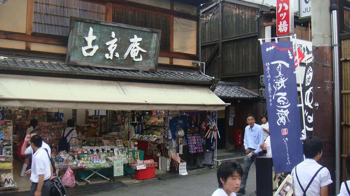 A colorful display of traditional Japanese craft souvenirs and omiyage gifts at a shop, perfect for bringing home memories of Nagoya, Japan