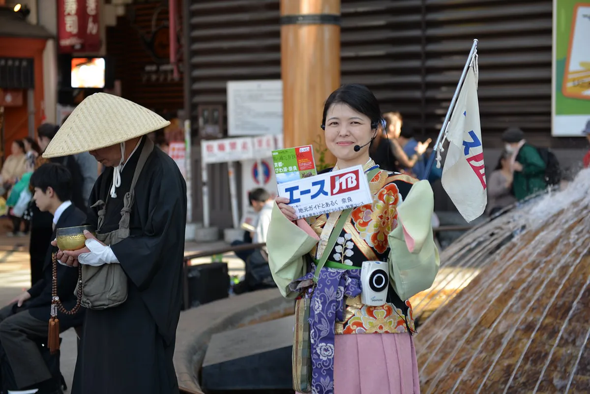 Kintetsu Nara Station entrance area with passengers and shoppers outside the underground station in central Nara, Japan
