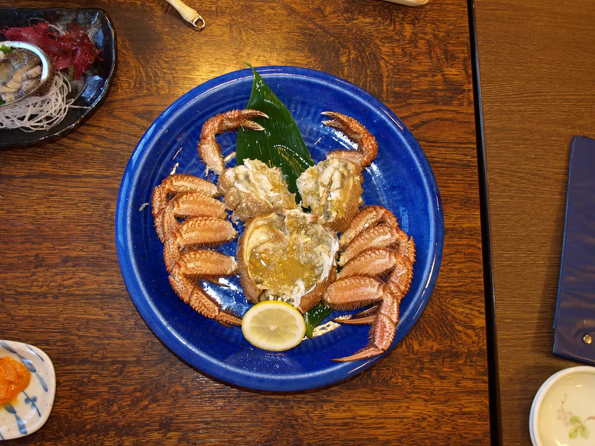 Freshly prepared Hokkaido snow crab served at a seafood restaurant in Japan