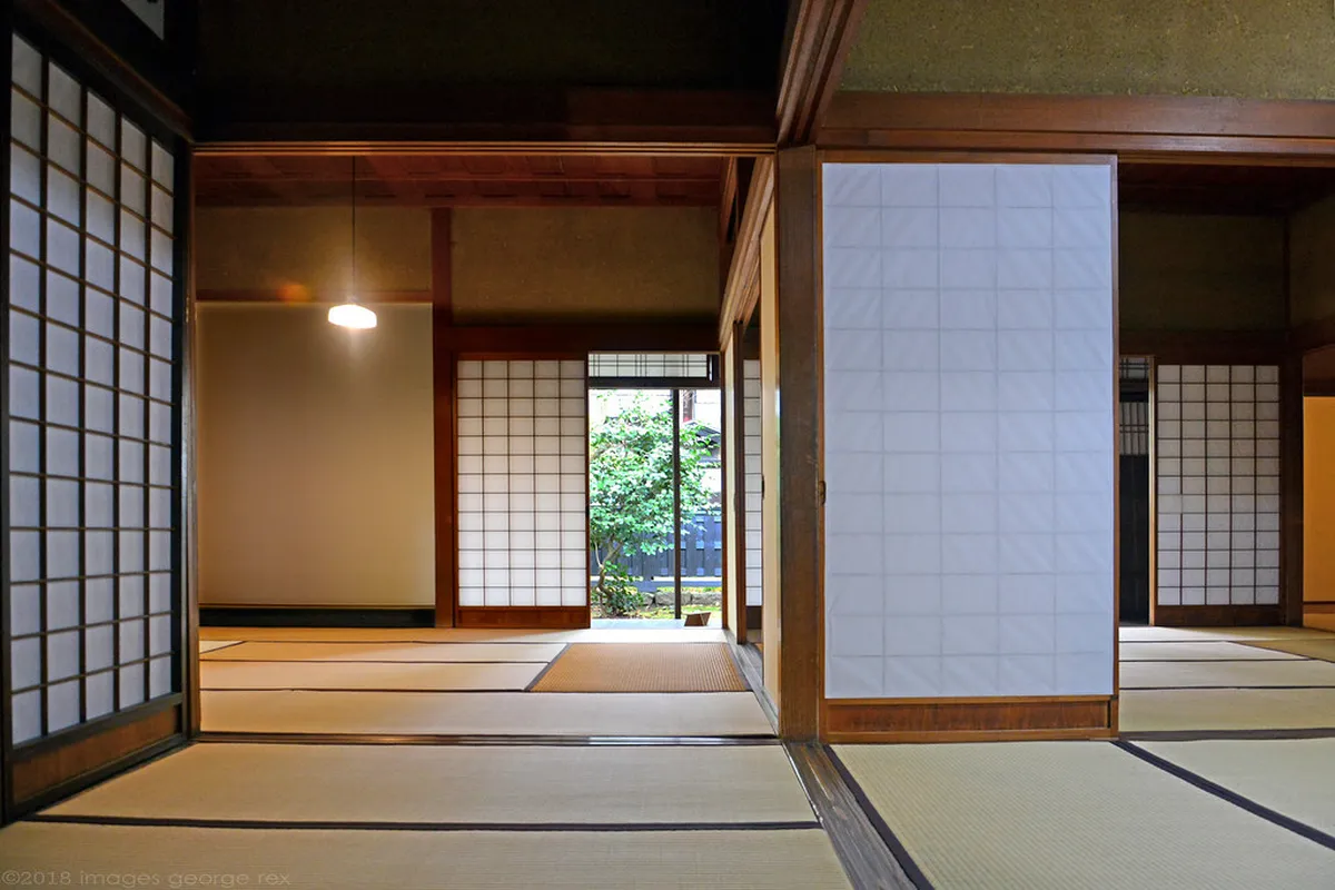 Exquisite gold-leaf fusuma screen paintings inside a samurai residence in Kanazawa's Nagamachi district, representing Edo-period artistic patronage