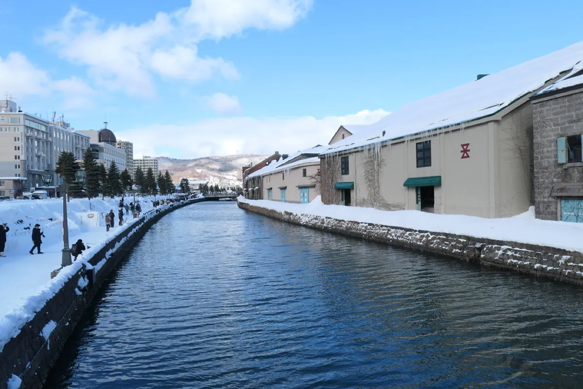 Historic Otaru Canal with gas lamps and stone warehouses in Hokkaido