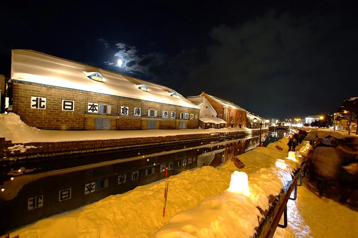 Floating candles and snow lanterns on the Otaru Canal at the Snow Light Path, Japan — 2