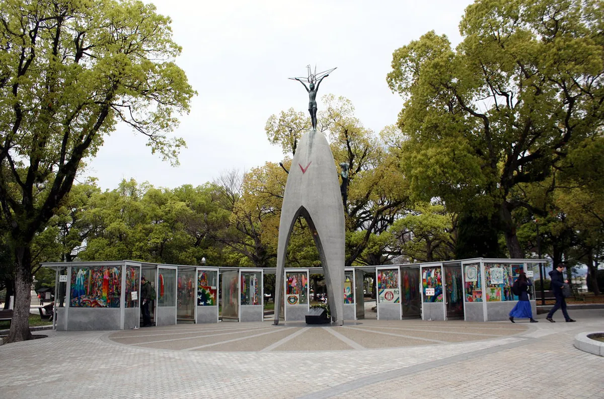 Children's Peace Monument in Hiroshima with colorful paper cranes donated by visitors from around the world