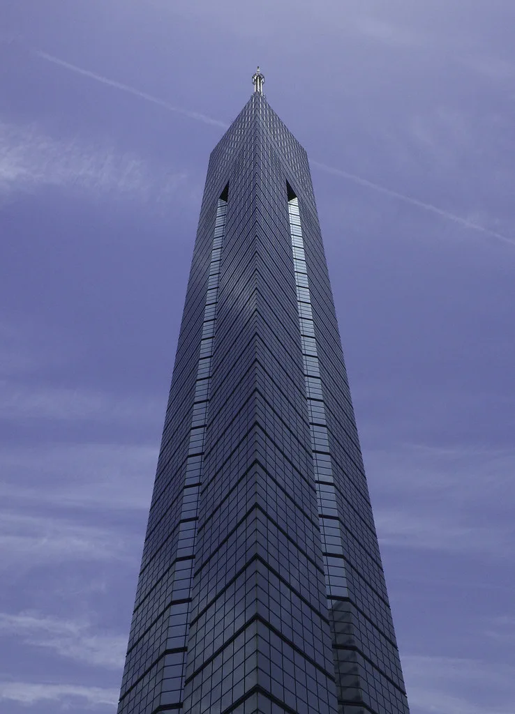 Fukuoka Tower rising above the city skyline at dusk